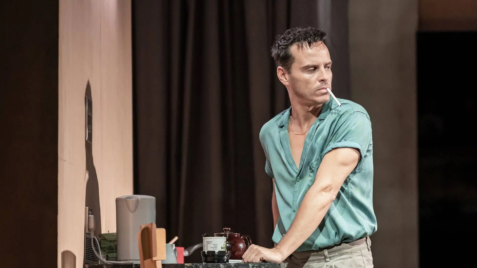 Andrew Scott in a performance of Vanya, looking extremely handsome in a mint green button-down shirt that really shows off his arms in a pleasing way