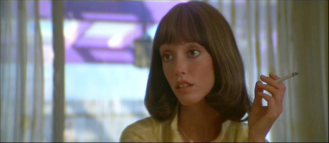 A still from 3 Women that shows Shelley Duvall, the icon herself, holding a cigarette in such a perfect way that it seems like her hand was formed specifically for this purpose